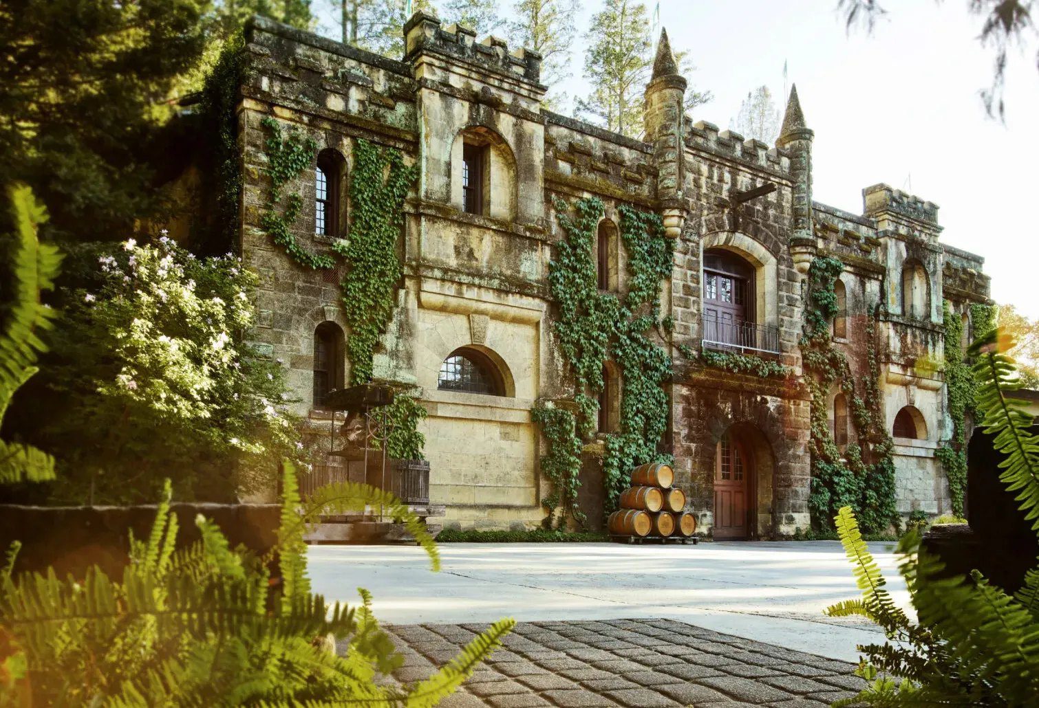 The stone château at Chateau Montelena, framed by gardens